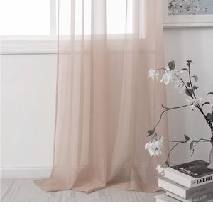 Pair of blush pink sheer curtains